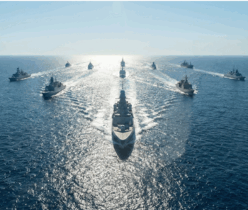 In the twenty-first century, the power to interrupt movement may matter more than the power to seize territory. Modern wars are no longer fought only over land, cities, or borders. Increasingly, they unfold across the systems that keep the global economy moving. Shipping routes, energy corridors, undersea cables, and maritime logistics have become the hidden arteries of international power. When these arteries are threatened, the consequences ripple far beyond the immediate battlefield. What makes this phase of conflict different is that power is increasingly exercised not through territorial conquest, but through the ability to disturb the systems that sustain global movement. Military exchanges may begin with missiles, air strikes, or naval incidents, yet their consequences quickly spread through the logistical networks that sustain trade, communication, and finance. In such an environment, the ability to interrupt movement may prove as consequential as the ability to seize territory. Recent tensions across West Asia illustrate how quickly this transformation becomes visible. Confrontations that begin within the political boundaries of states often extend outward into the infrastructure that supports global commerce. Maritime routes, energy shipments, and supply chains become indirect arenas of pressure where strategic signalling unfolds without formal declarations of expanded war. Sea lanes across the Arabian Sea and the wider Indian Ocean carry enormous volumes of energy and commercial traffic linking the Middle East, Africa, and Asia. Tankers transporting crude oil from the Gulf travel through these waters toward the manufacturing centres of Asia. Container vessels carrying goods between Europe and Asia follow similar routes. The uninterrupted functioning of these maritime highways sustains industries, financial markets, and consumer economies across multiple continents. Yet these routes are not only conduits of prosperity; they are also points of vulnerability. Even limited instability can trigger cascading consequences. A disruption in shipping schedules, a spike in maritime insurance premiums, or the temporary rerouting of vessels can ripple through global supply chains. Costs increase, delivery times extend, and economic uncertainty spreads far beyond the immediate theatre of confrontation. An often overlooked but powerful instrument in this logistical contest is the global shipping insurance system. Modern maritime trade depends heavily on insurance coverage provided by international financial institutions. When tensions intensify in a particular region, insurance premiums for vessels passing through affected waters can rise sharply. In extreme situations, coverage may even be withdrawn. Shipping companies may then avoid certain routes altogether, not because passage is impossible, but because the financial risks become too great. Trade slows not necessarily because ships cannot sail, but because the financial architecture supporting their movement becomes uncertain. Another factor that amplifies the strategic importance of maritime logistics is the presence of narrow maritime chokepoints that connect major oceans and trading regions. The Strait of Hormuz, the Bab el-Mandeb, the Suez Canal, and the Strait of Malacca together form a chain of gateways through which enormous volumes of global trade and energy transit every day. A disturbance in even one of these passages can quickly cascade through the wider global economy. Ships may be forced to reroute across longer distances, fuel costs rise, delivery schedules shift, and commodity markets respond almost immediately. Control or disruption of chokepoints therefore provides strategic leverage that extends far beyond the immediate geographic area. Modern naval competition increasingly revolves around presence and influence near these corridors rather than traditional fleet-to-fleet engagements. Surveillance vessels, drones, submarines, and escort fleets operate quietly along these routes, monitoring movement and signalling strategic intent. The objective is often not direct confrontation but the demonstration that critical supply routes remain within reach should geopolitical tensions escalate. This environment has also encouraged the rise of what analysts describe as “grey-zone maritime activity.” Instead of open naval battles, tensions frequently unfold through ambiguous incidents involving patrol vessels, unmanned platforms, or unidentified actors operating in contested waters. A tanker delayed, a cargo ship inspected, or a naval vessel shadowed by another fleet can send powerful signals without crossing the threshold of declared hostilities. Such incidents create uncertainty for shipping companies and insurers while allowing states to maintain plausible deniability. Even the perception of risk can alter global trade patterns. Shipping companies may choose longer but safer routes. Insurance costs may rise sharply. Commodity markets may react to perceived instability rather than actual disruption. In this way, maritime logistics becomes both the stage and the instrument of modern geopolitical competition. Another dimension of this logistical battlefield lies beneath the ocean itself. Thousands of kilometres of undersea fibre-optic cables carry the overwhelming majority of the world’s digital communications and financial transactions. These cables form the invisible infrastructure of the global economy, linking financial markets, data centres, and communication networks across continents. Though rarely discussed in traditional security debates, their vulnerability has increasingly drawn the attention of strategic planners. A disruption to even a small segment of this network could affect banking systems, digital trade, and communication flows far beyond the immediate region. Taken together, maritime logistics, energy corridors, digital infrastructure, and financial systems form the web of connectivity that sustains the contemporary global order. Pressure applied at any point within this network can produce consequences far greater than the physical act itself. Modern conflict therefore operates not only through visible military force but also through the manipulation of interconnected systems. For countries positioned along major maritime corridors, these developments carry immediate strategic implications. India, located at the centre of the Indian Ocean’s sea lanes, occupies a geography that intersects with some of the world’s most vital trade and energy routes. The uninterrupted movement of ships through these waters supports India’s economic growth, industrial supply chains, and energy security. India’s strategic environment therefore demands constant attention to maritime stability. Energy imports, commercial trade, and digital connectivity all depend upon secure sea lanes and reliable logistical networks. Any disruption within these corridors inevitably intersects with national planning and economic resilience. At the same time, India maintains relationships with multiple actors across the broader West Asian region. Defence cooperation with Israel continues to evolve, energy engagement with Gulf producers remains essential, and diplomatic dialogue with Iran carries long-term strategic significance. Navigating these overlapping relationships requires careful diplomacy and strategic autonomy. In an era where conflict increasingly touches logistical networks rather than territorial borders alone, maintaining stability in the maritime domain becomes a critical component of national strategy. Naval presence, maritime surveillance, and regional cooperation all play roles in ensuring that the infrastructure of global commerce remains protected from disruption. The broader international system reflects a similar recalibration. Major powers understand that disturbances to global logistics can produce consequences extending far beyond immediate battlefields. Energy markets, commodity flows, financial transactions, and digital connectivity link economies across continents. Actions that disrupt these networks risk unintended economic and political repercussions for multiple actors simultaneously. As a result, modern conflict often unfolds through calibrated pressure rather than large-scale territorial conquest. Strategic signalling may occur through naval deployments, maritime incidents, or economic disruptions that influence global systems without triggering full-scale war. The objective is not always to capture territory but to demonstrate the ability to affect movement and connectivity. Understanding this transformation is essential for interpreting contemporary geopolitical tensions. Conflicts may still begin with traditional military exchanges, yet their broader consequences increasingly travel through the logistical systems that sustain modern life. Oil shipments, container routes, digital cables, and insurance frameworks all become potential points of leverage. Modern conflict therefore follows the pathways of movement rather than the lines of territory. The routes that carry oil, goods, digital data, and financial transactions have become the quiet pressure points of geopolitical competition. Disruptions along these arteries can reverberate across continents long before armies meet on conventional battlefields. In the twenty-first century, the decisive battles of power may be fought not over land, but over movement itself.